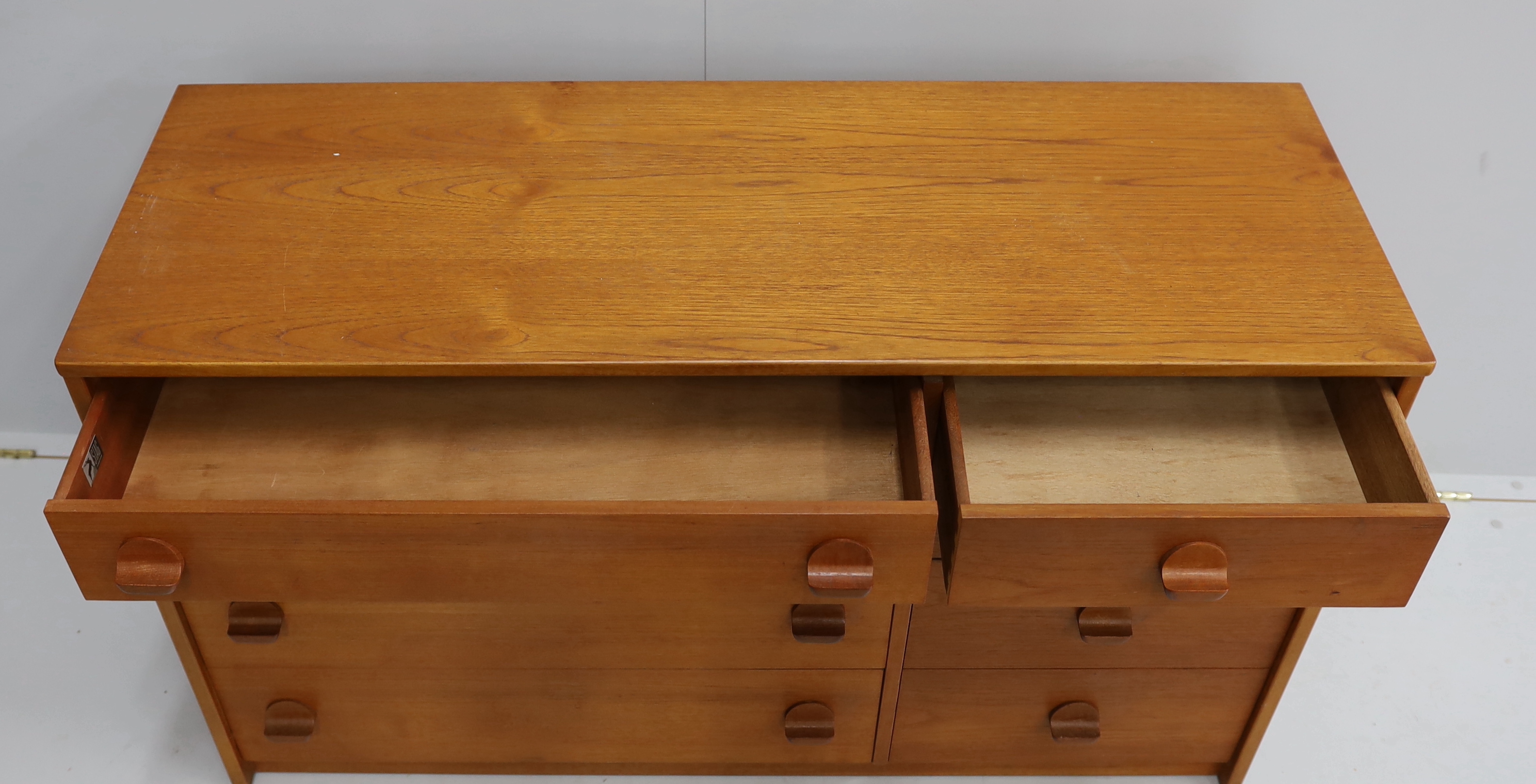 Ron Carter for Stag Furniture - A 'Cantata' teak chest of eight drawers, width 118cm, depth 44cm, height 69cm